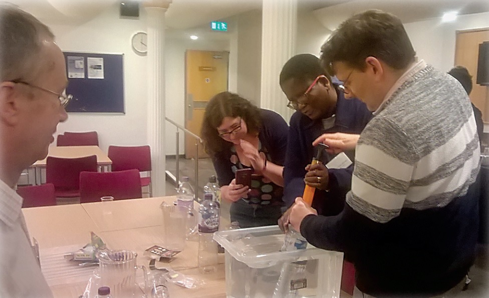 Mathematicians at the agri-food study group in Edinburgh conducting simple experimental work