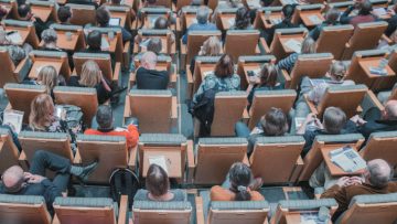 View-from-above-of-an-auditorium-full-of-students