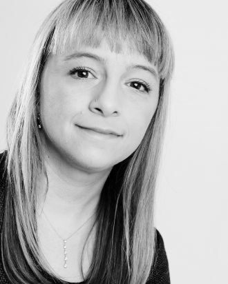 A black and white photo of Sabine Hauert